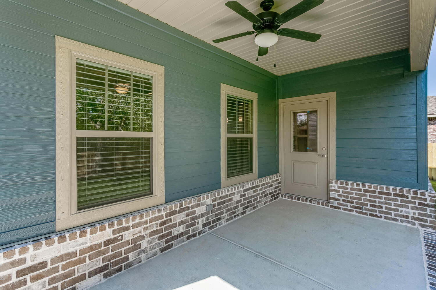 6695 Rocky Shores Road Milton, FL 32583 - Photo 46 of 53 a view of a porch with a table and chairs