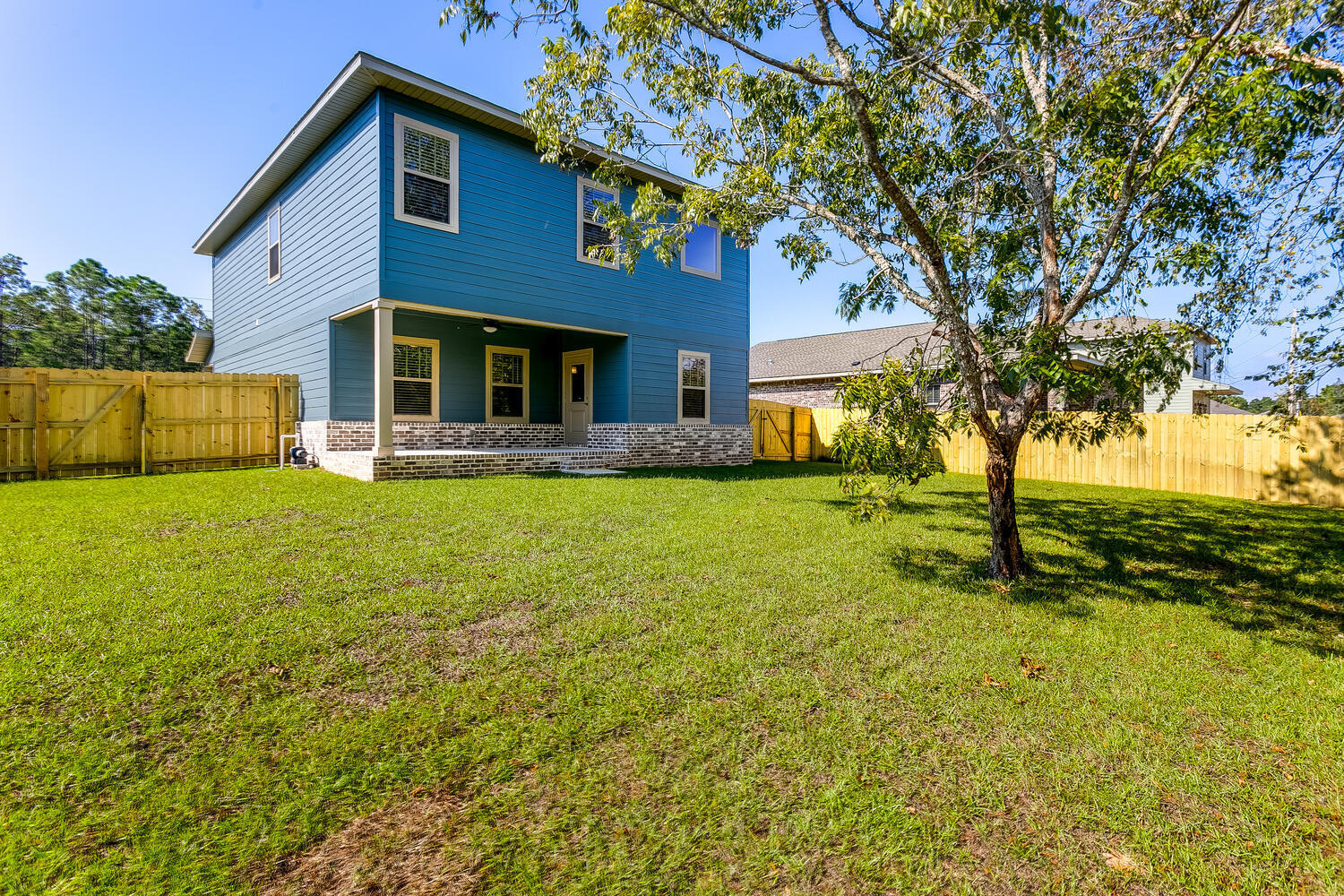 6695 Rocky Shores Road Milton, FL 32583 - Photo 50 of 53 a front view of house with yard and green space