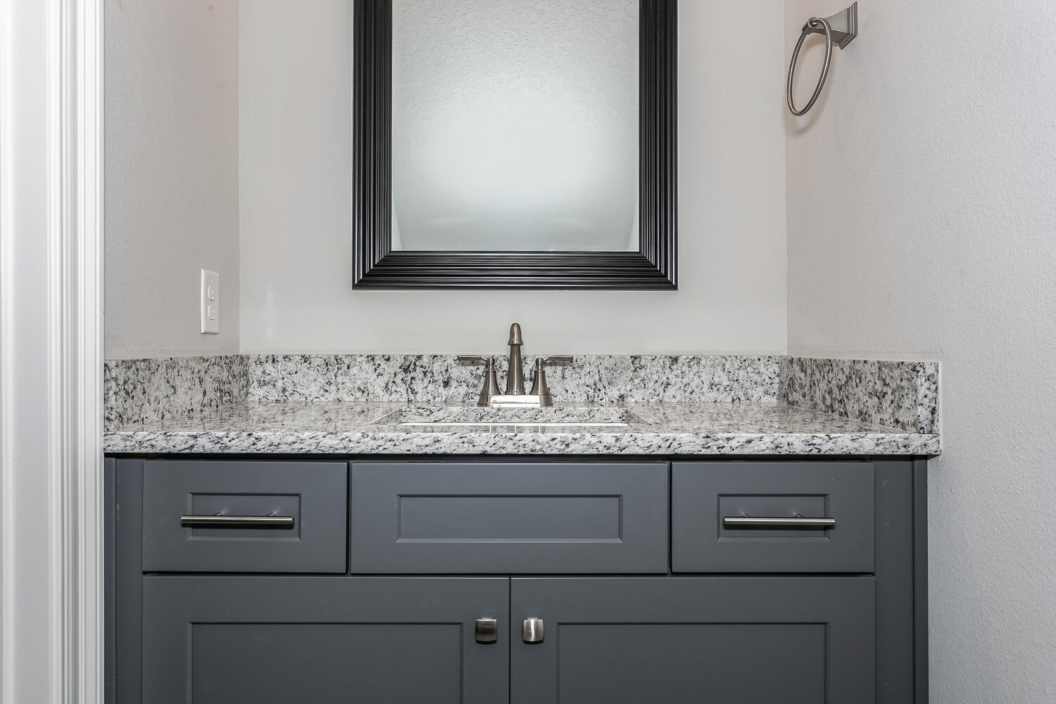 6695 Rocky Shores Road Milton, FL 32583 - Photo 5 of 53 a bathroom with a granite countertop double vanity sink and mirror