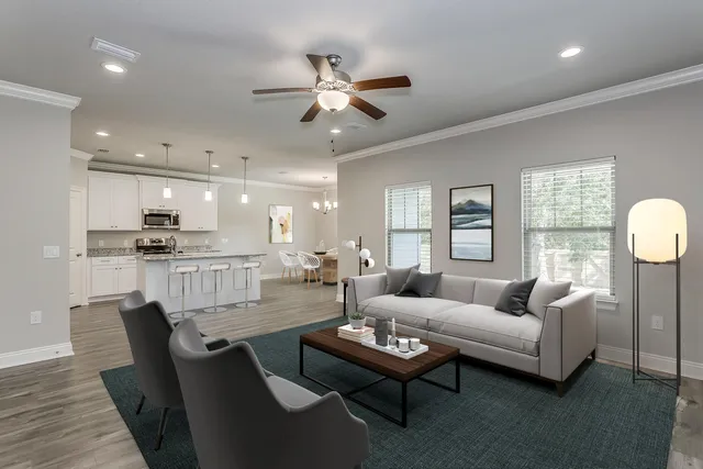 an empty room with white walls and windows