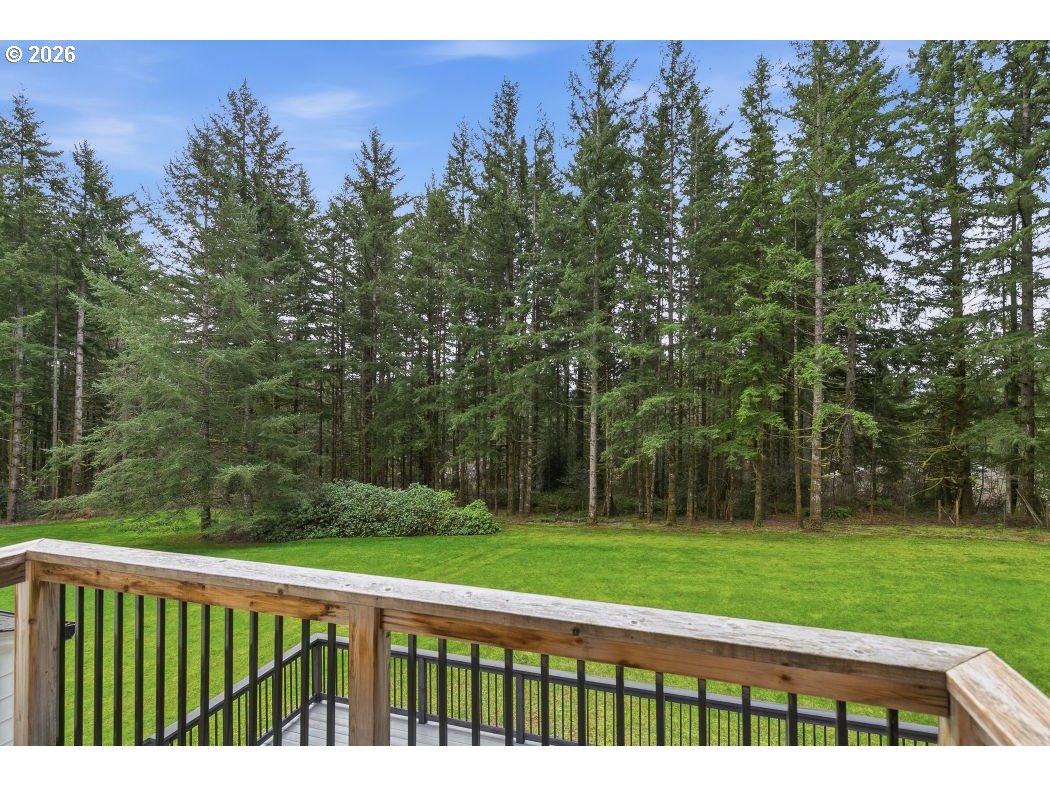 3708 Northeast 292nd Avenue Camas, WA 98607 - Photo 29 of 44 a view of a yard with a house in the background