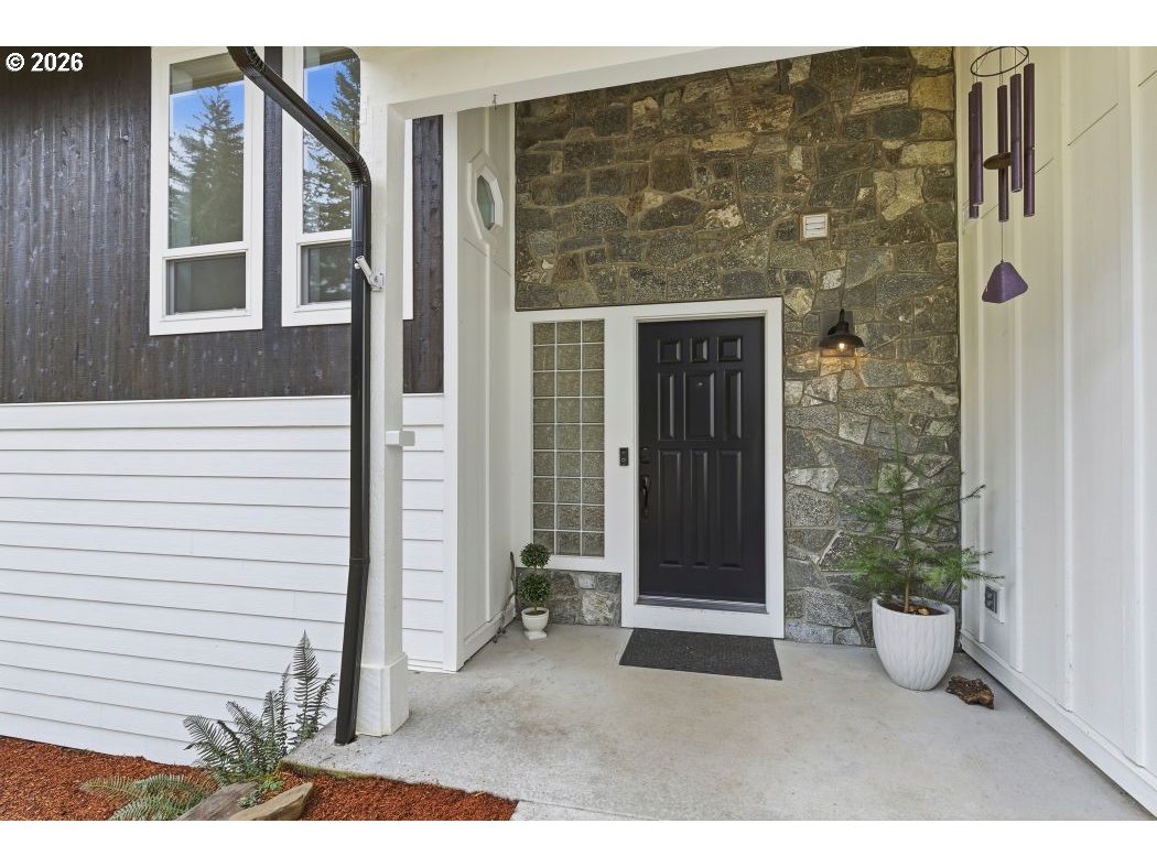 3708 Northeast 292nd Avenue Camas, WA 98607 - Photo 4 of 44 a couple of potted plants in front of door