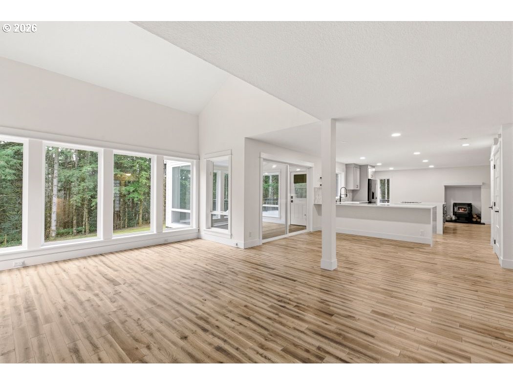 3708 Northeast 292nd Avenue Camas, WA 98607 - Photo 5 of 44 a view of empty room with wooden floor and windows