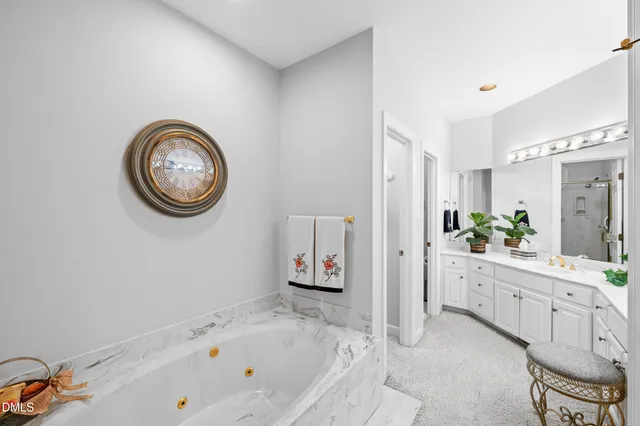 a bathroom with a bathtub and a sink