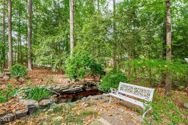 a view of a bench in a garden
