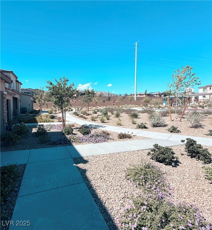 10772 Astell Isle Court Las Vegas, NV 89166 - Photo 2 of 32 View of yard with a residential view