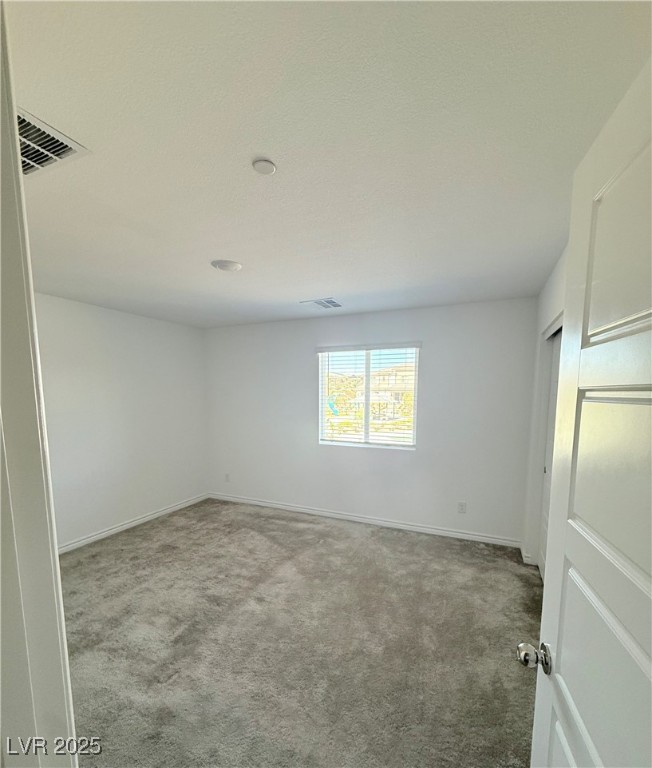 10772 Astell Isle Court Las Vegas, NV 89166 - Photo 23 of 32 Entrance to primary bedroom featuring baseboards