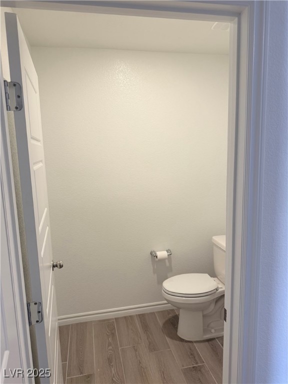 10772 Astell Isle Court Las Vegas, NV 89166 - Photo 8 of 32 Powder room featuring wood tiled floors