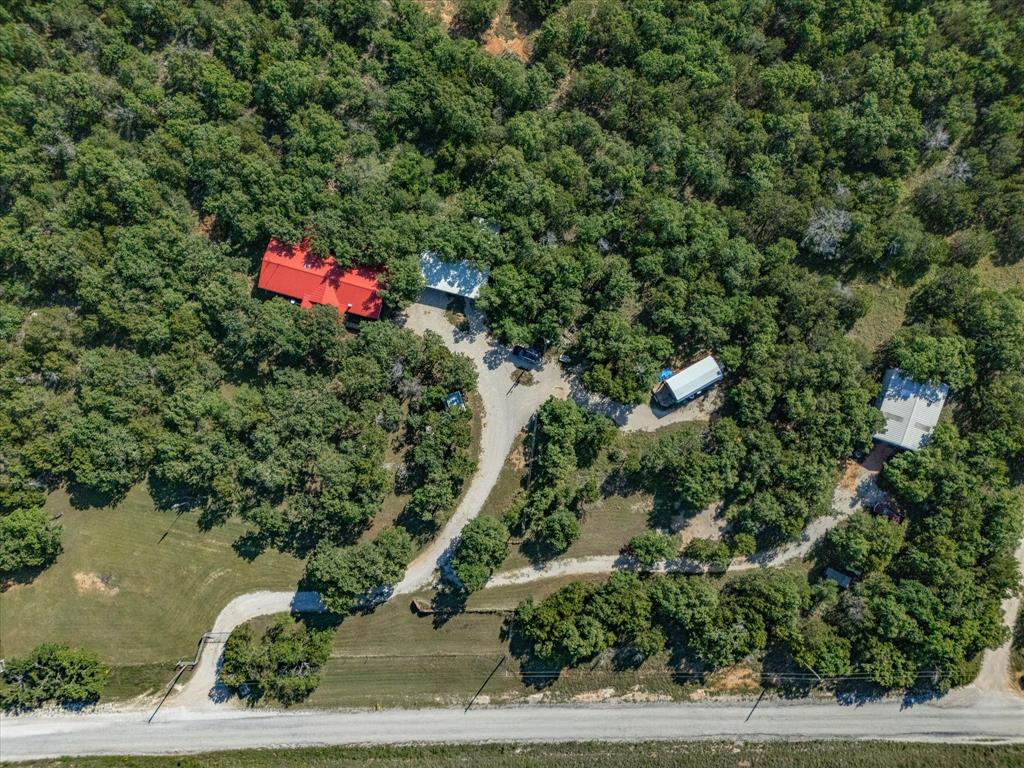 3275 Finis Road Graham, TX 76450 - Photo 35 of 36 an aerial view of a house with a yard and outdoor seating