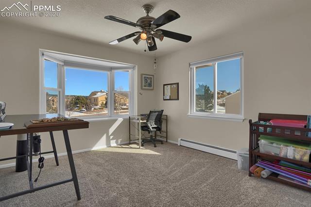 965 Bowstring Road Monument, CO 80132 - Photo 21 of 34 One upper bedroom with walk-in closet. Bedroom now used as an office.