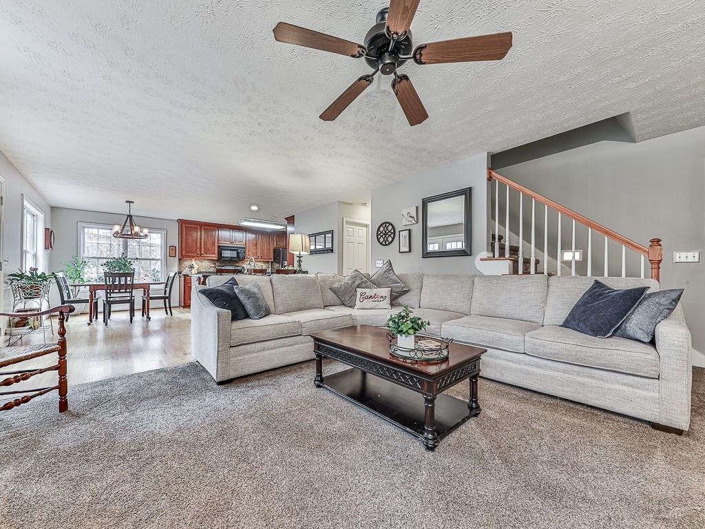 1108 Fieldstone Drive Canton, GA 30114 - Photo 18 of 40 a living room with furniture and a view of kitchen