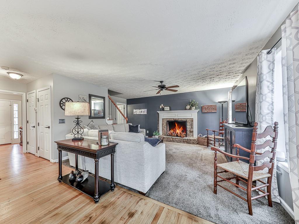 1108 Fieldstone Drive Canton, GA 30114 - Photo 19 of 40 a living room with furniture and a fireplace