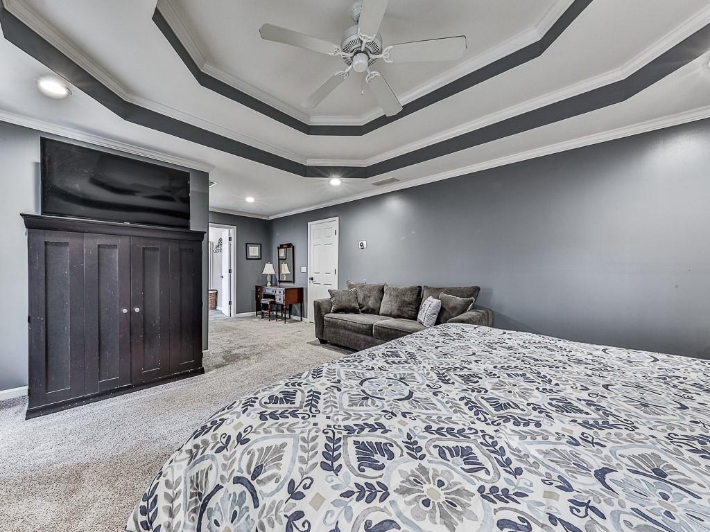 1108 Fieldstone Drive Canton, GA 30114 - Photo 27 of 40 a bed room with a bed and a television