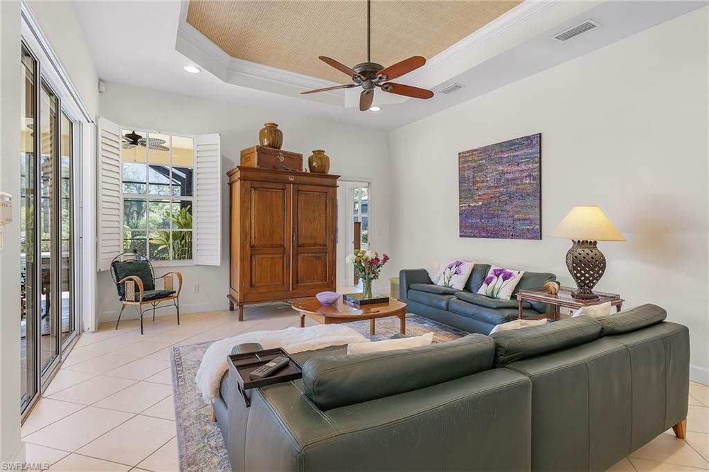 20187 Buttermere Court Estero, FL 33928 - Photo 13 of 40 a living room with furniture and a large window