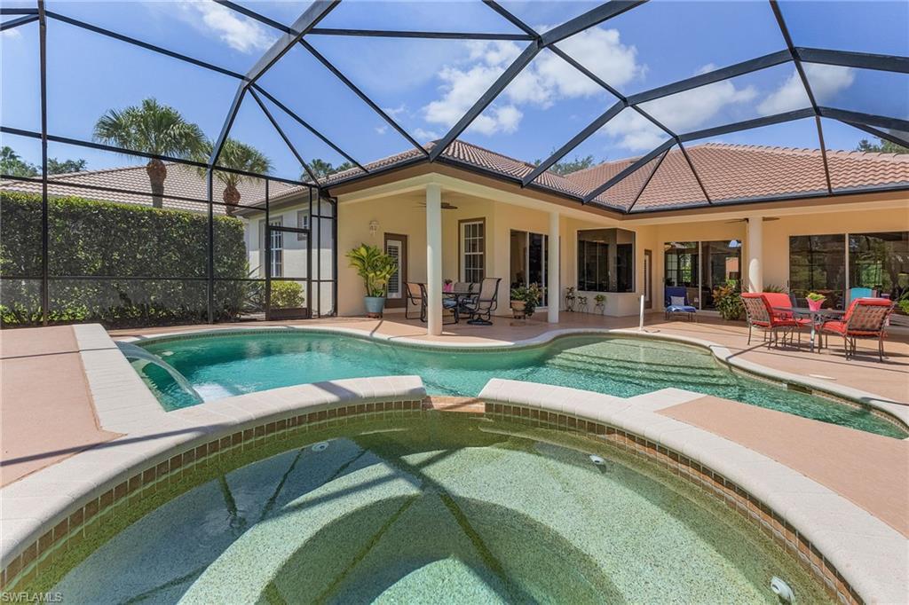 20187 Buttermere Court Estero, FL 33928 - Photo 14 of 40 a view of a house with backyard porch and sitting area