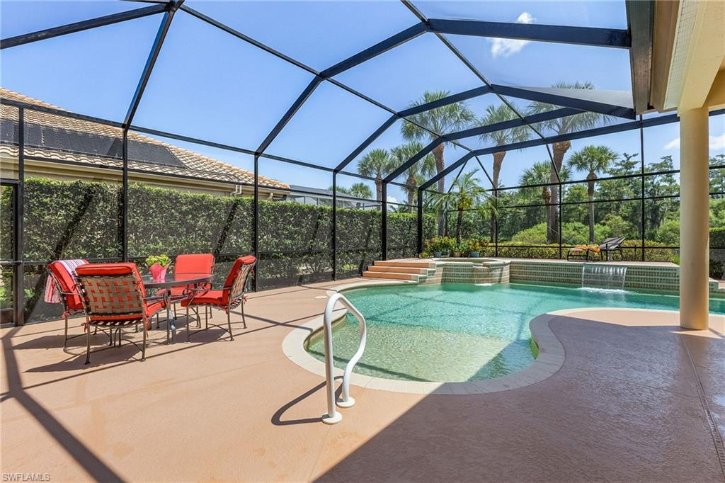 20187 Buttermere Court Estero, FL 33928 - Photo 16 of 40 a view of a swimming pool with a patio