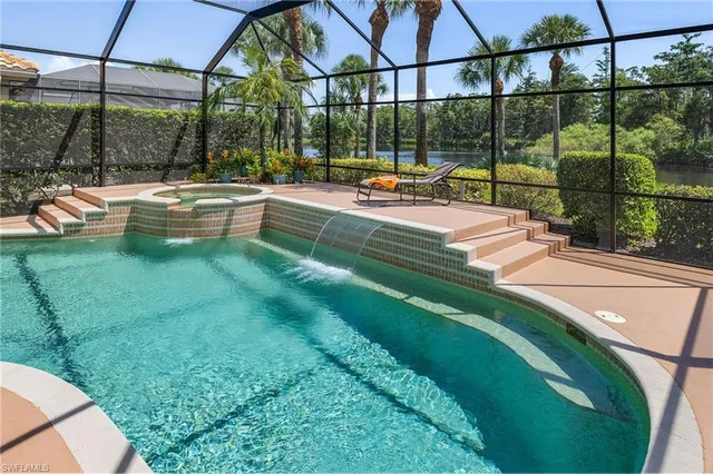 a view of a backyard with sitting area