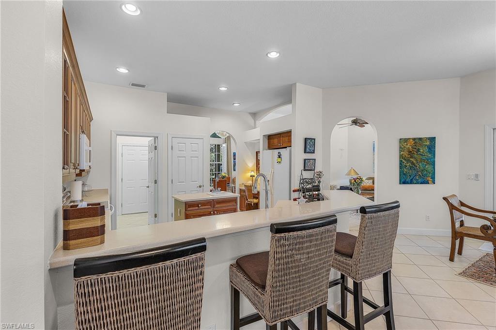 20187 Buttermere Court Estero, FL 33928 - Photo 24 of 40 a view of a dining room with furniture
