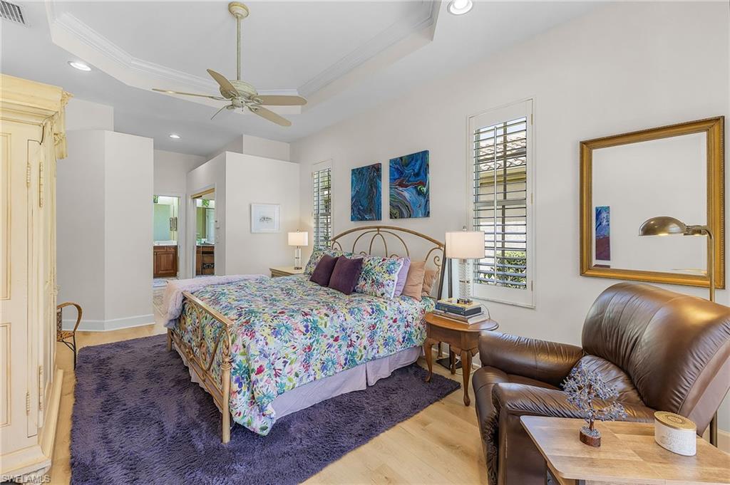 20187 Buttermere Court Estero, FL 33928 - Photo 31 of 40 a bedroom with a bed window and couch