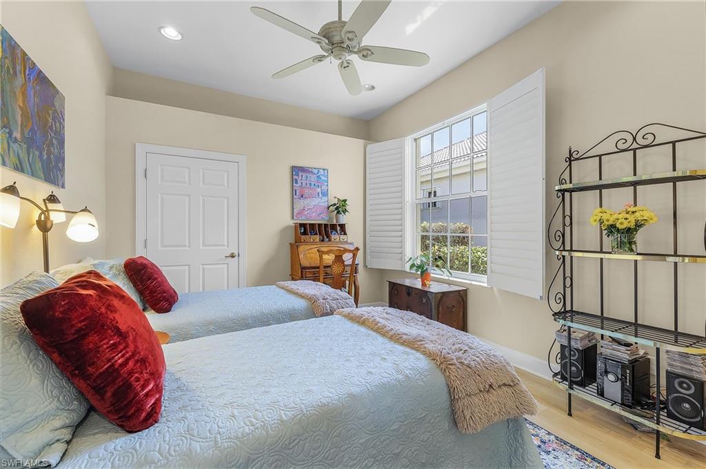 20187 Buttermere Court Estero, FL 33928 - Photo 37 of 40 a bedroom with a large bed and a window