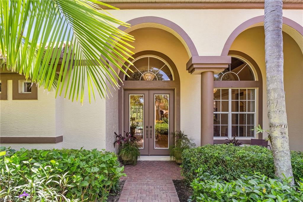 20187 Buttermere Court Estero, FL 33928 - Photo 4 of 40 a view of entrance gate of a house