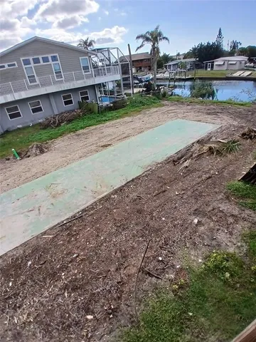 a view of a street with a building in the background