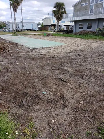 a view of a town with large trees