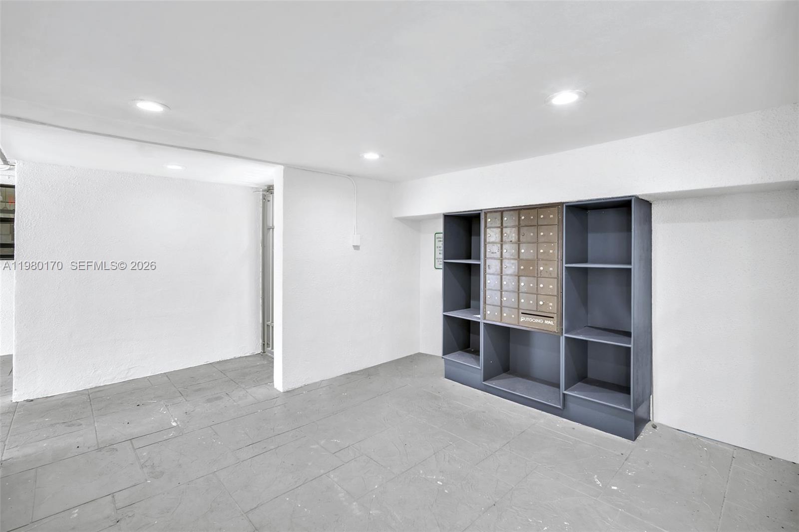 3265 Virginia Street, Unit 25 Miami, FL 33133 - Photo 19 of 28 a view of an empty room with a window