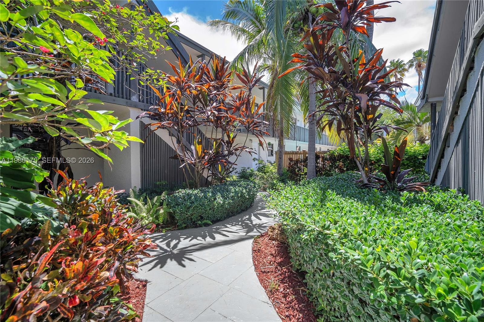 3265 Virginia Street, Unit 25 Miami, FL 33133 - Photo 25 of 28 a view of a garden with plants