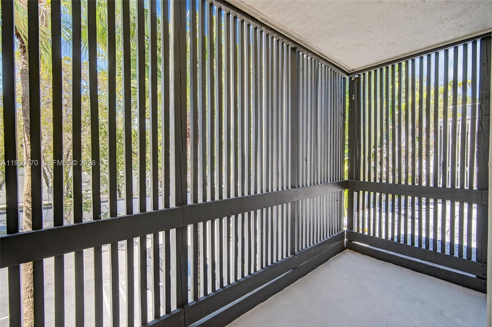 3265 Virginia Street, Unit 25 Miami, FL 33133 - Photo 6 of 28 a view of a black gate