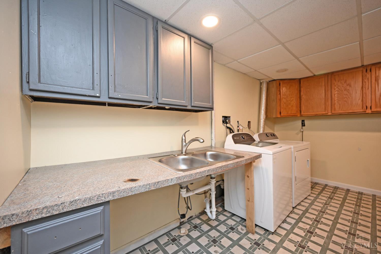 7853 West Chester Road West Chester, OH 45069 - Photo 37 of 54 Laundry room 14'4"x11'8" and the washer and dryer stay!