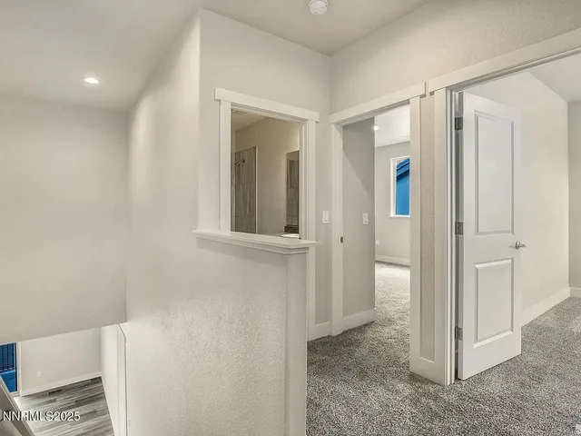 a view of a bathroom with a glass door