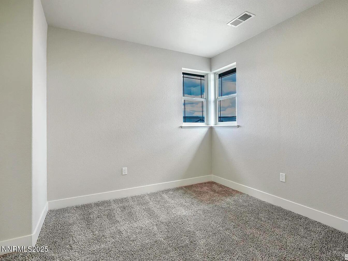 455 Axelson Way Genoa, NV 89411 - Photo 24 of 30 an empty room with a window