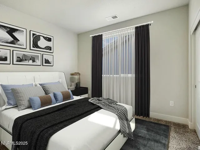 a bedroom with a large bed and closet