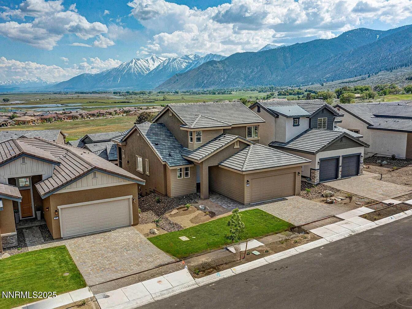 455 Axelson Way Genoa, NV 89411 - Photo 3 of 30 an aerial view of a house with a garden and yard