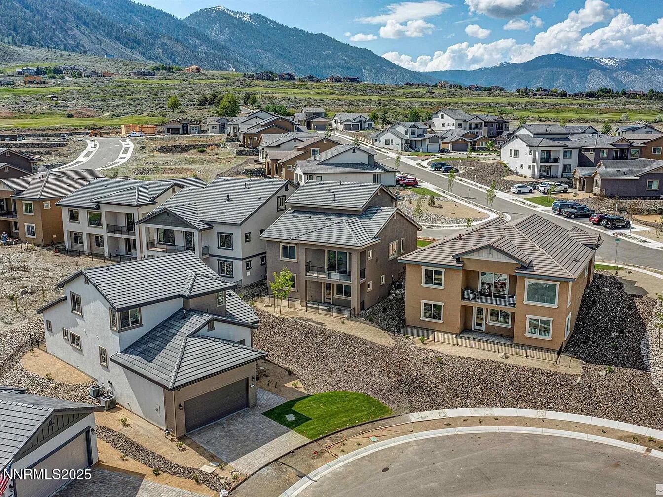 455 Axelson Way Genoa, NV 89411 - Photo 5 of 30 an aerial view of residential houses with outdoor space and ocean view