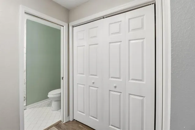 a view of a bathroom with toilet