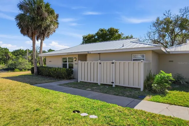 a house view with a garden space