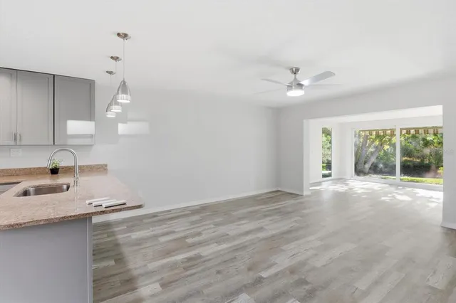 a view of an empty room with a sink