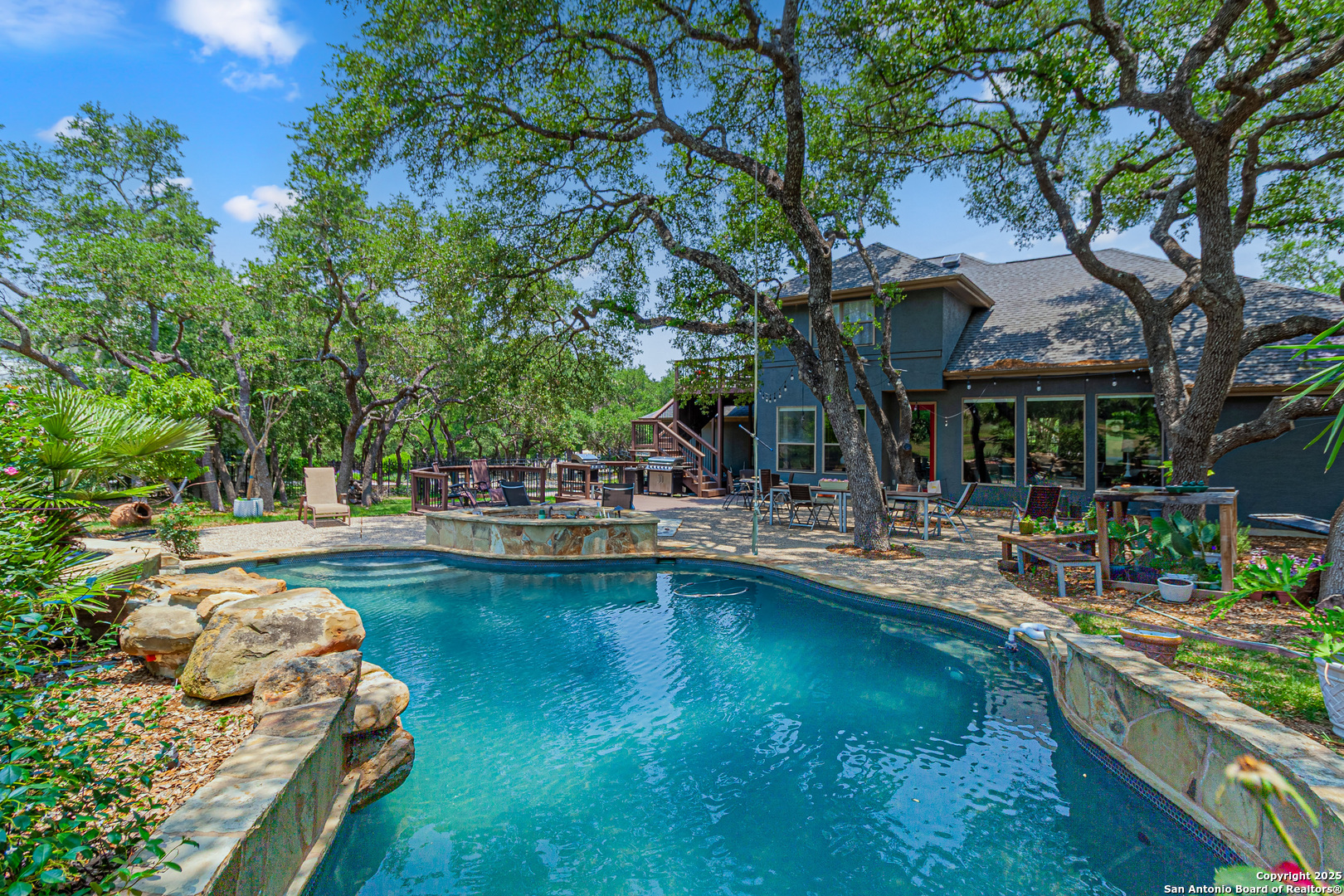 1320 River Spring Branch, TX 78070 - Photo 1 of 1 a swimming pool with outdoor seating and yard