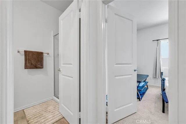 a view of storage and utility room with empty racks