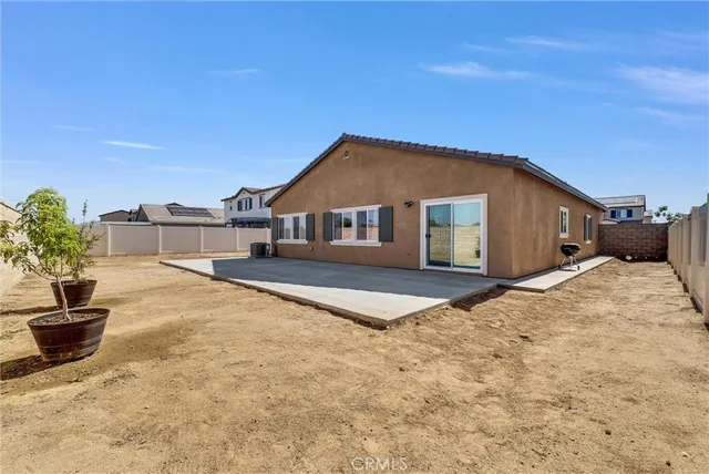a house view with a backyard space