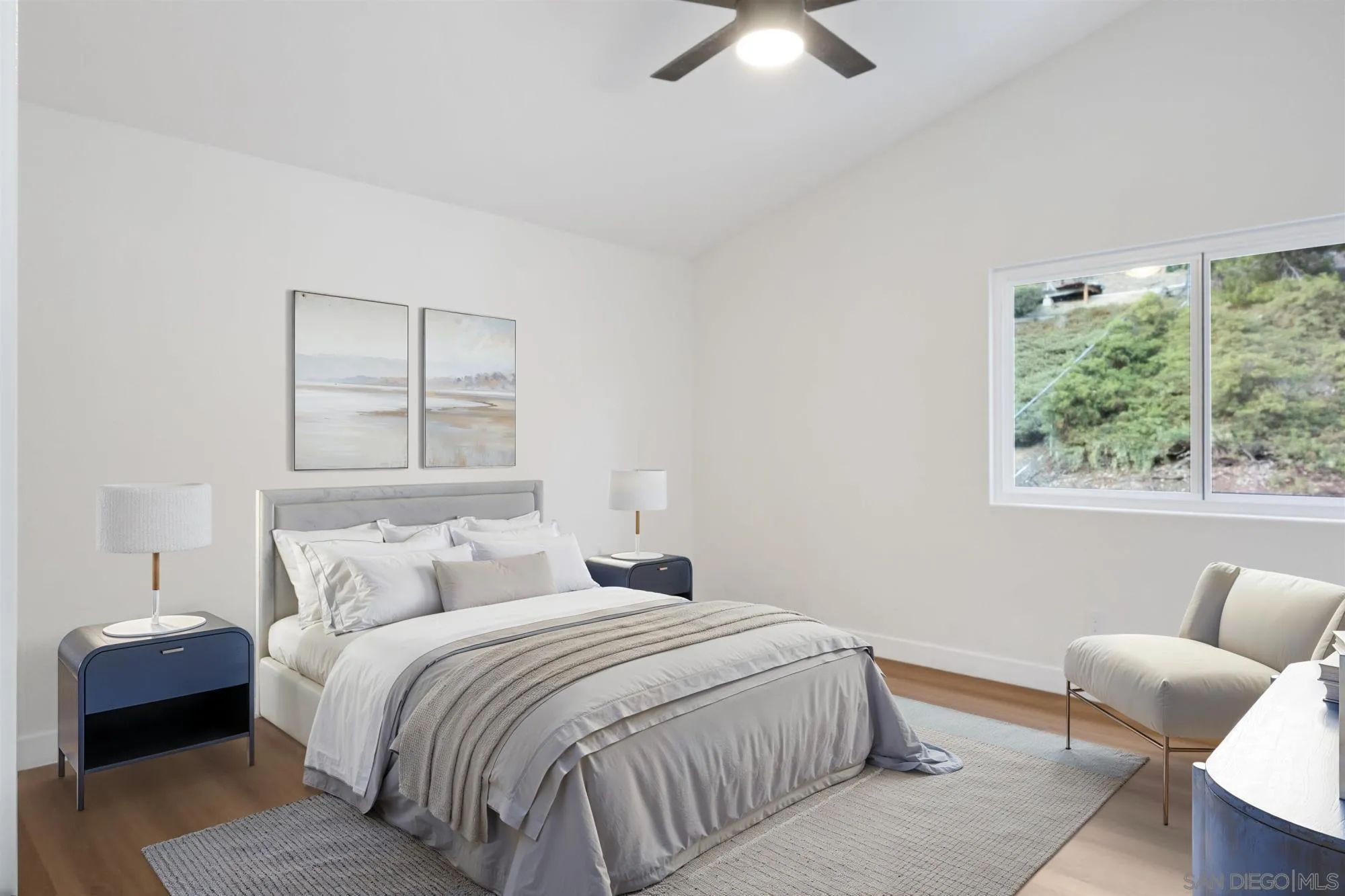 4350 Point Reyes Court Carlsbad, CA 92010 - Photo 13 of 33 a bedroom with a bed and a couch