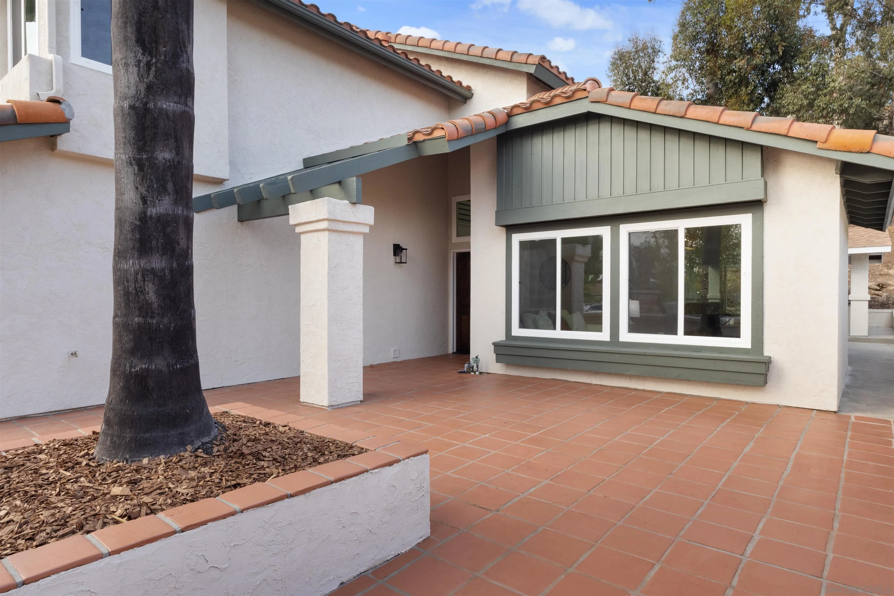 4350 Point Reyes Court Carlsbad, CA 92010 - Photo 32 of 33 a front view of a house with garden