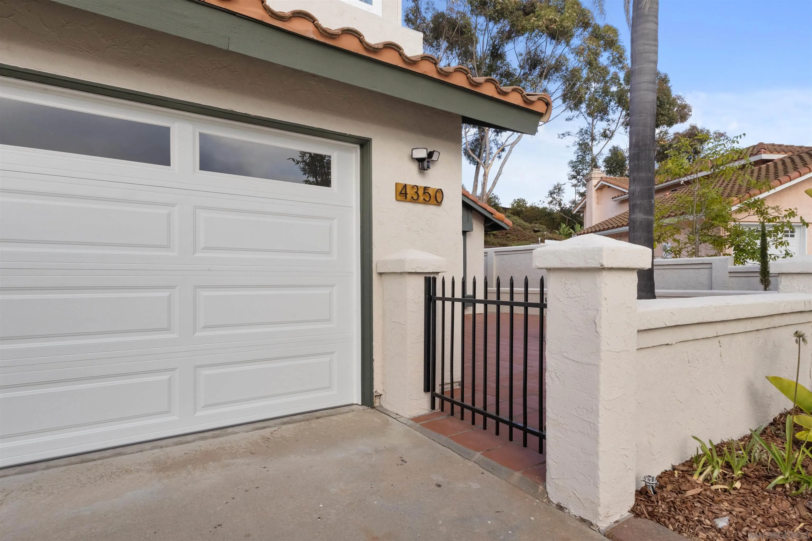 4350 Point Reyes Court Carlsbad, CA 92010 - Photo 33 of 33 a view of a house with a garage