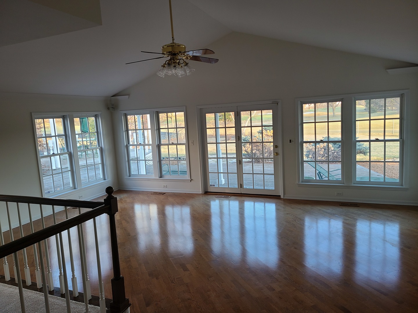 630 Greenview Road Itasca, IL 60143 - Photo 2 of 12 a view of an empty room with wooden floor and a window