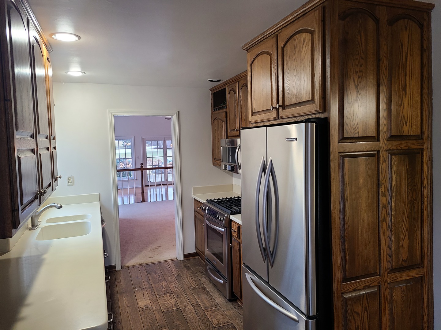 630 Greenview Road Itasca, IL 60143 - Photo 4 of 12 a metallic refrigerator freezer sitting in a kitchen