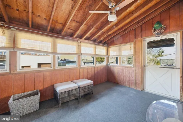 a room with furniture and window