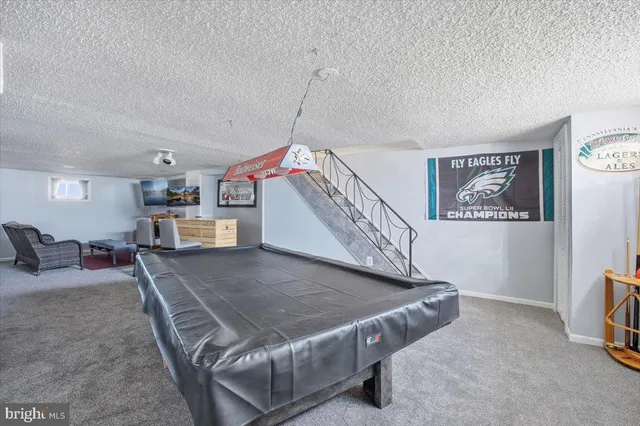 a living room with a couch and a table