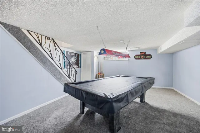 a room with furniture and wooden floor